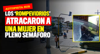 Le rompieron los vidrios del carro por robarla en pleno semáforo