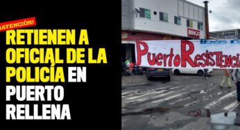 Retienen a oficial de la policía en Puerto Rellena